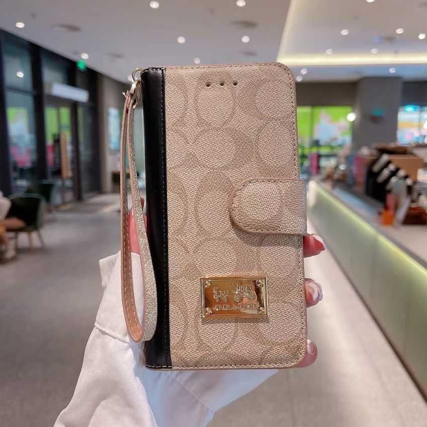 coach スマホケース iphone14