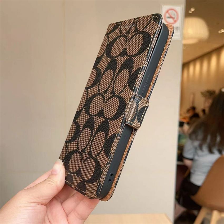 coach スマホケースiphone16plus スタンド機能